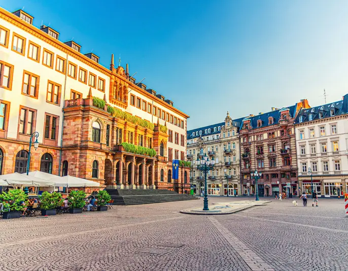Wiesbaden City Palace Stadtschloss or New Town Hall Rathaus neo-classical building on Schlossplatz Palace Square in historical city centre, blue sky background, State of Hesse, Germany